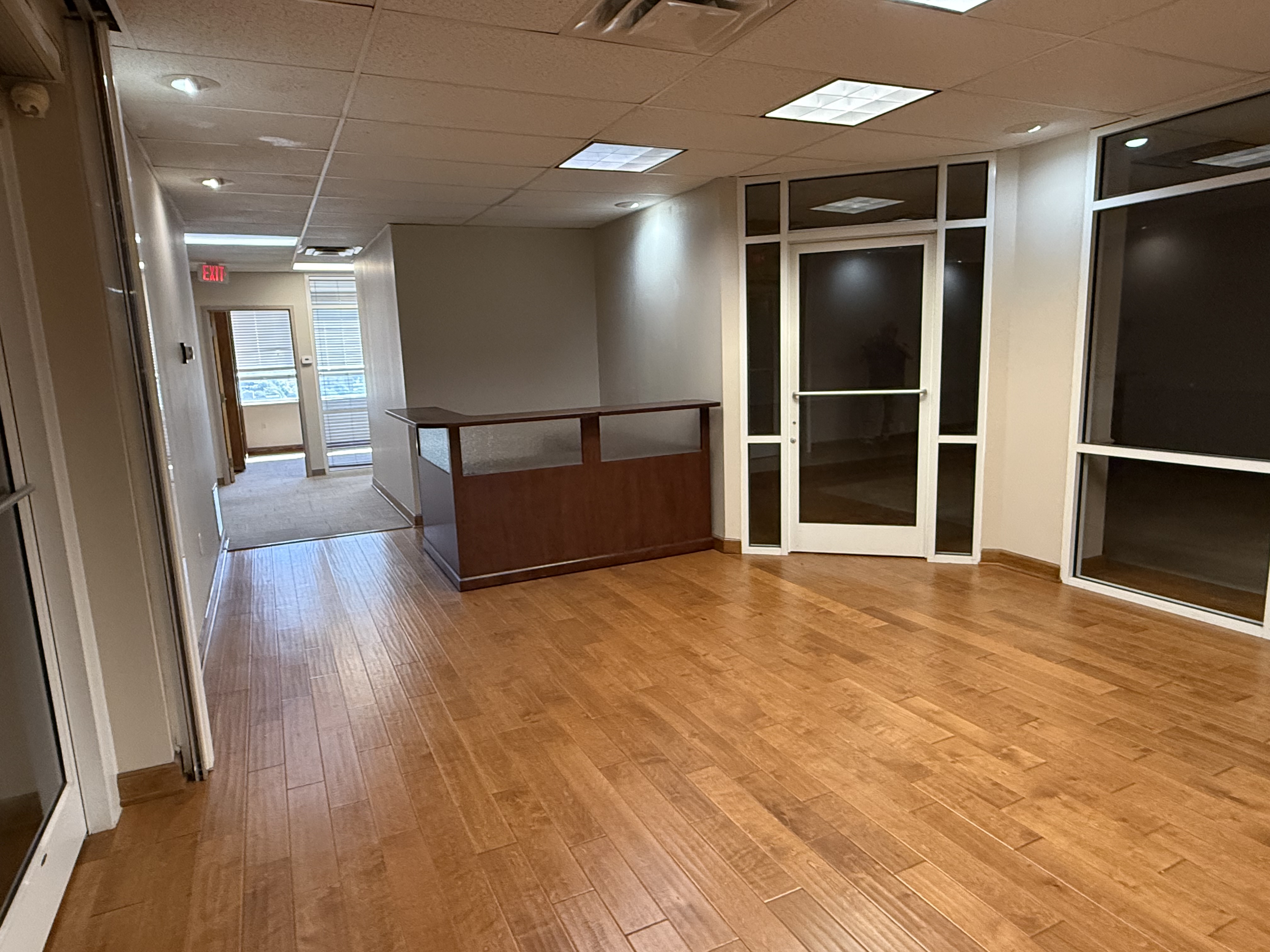 Suite 1200 reception area and glass-fronted rooms